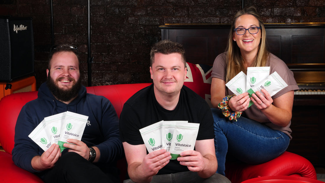 VitaVoice Founders holding packets of VitaVoice Optimise 